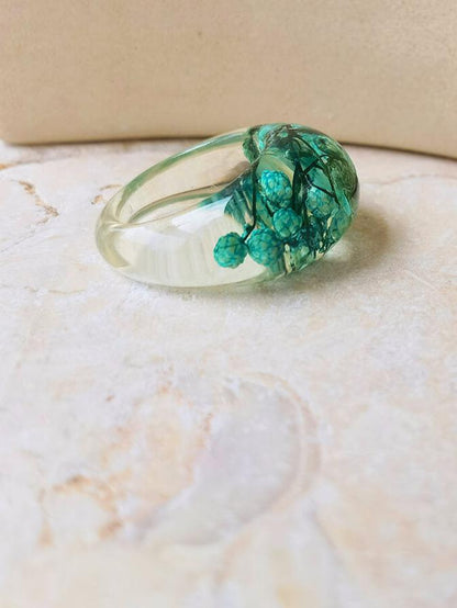 Dried flower resin ring with green flowers