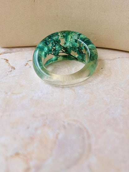 Dried flower resin ring with green flowers