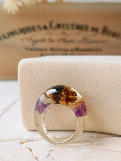 Dried flower resin ring with purple flowers