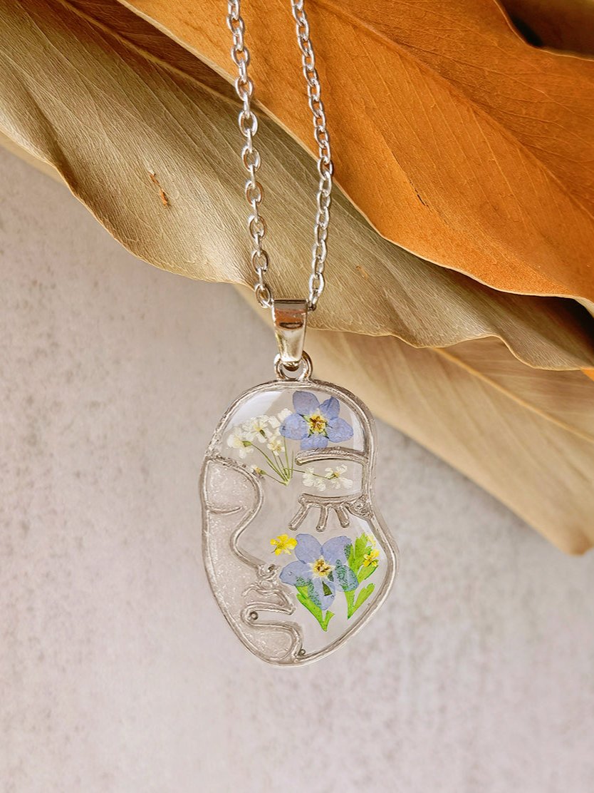 Forget Me Not Resin Pressed Flower Abstract Face Necklace