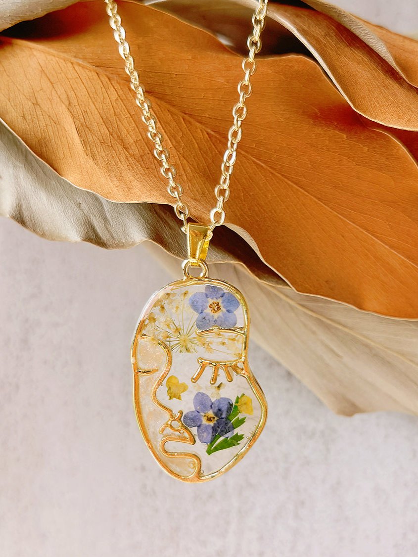 Forget Me Not Resin Pressed Flower Abstract Face Necklace